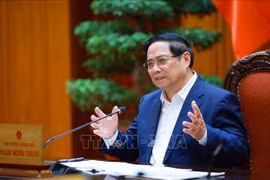 越南政府总理范明政召开工作会议，部署2026年军事国防任务。图自越通社
