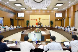 资料图：国会常委会于8月4日召开的会议现场。图自越通社