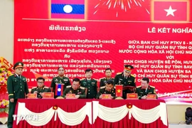 双方缔结友好关系签约仪式现场。图自越通社