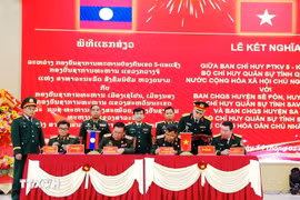 双方缔结友好关系签约仪式现场。图自越通社