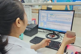 各医疗机构大力推进数字化转型工作，为患者提供便利。图自越通社