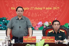 越南政府总理范明政在会议上发表讲话。图自越通社