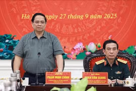 越南政府总理范明政在会议上发表讲话。图自越通社