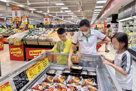 胡志明市各大超市在市场价格波动的背景下，积极加大促销力度，充分发挥平抑物价项目的效用。图自越通社