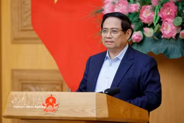 越南政府总理范明政主持召开与政策咨询委员会的工作会议。图自越通社