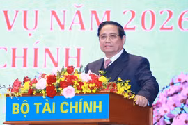 越南政府总理范明政出席会议并发表讲话。图自越通社