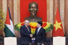 越南国家主席梁强会见约旦众议院议长马赞·图尔基·卡迪。图自越通社