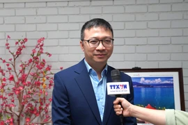 澳大利亚越南企业家协会（VBAA）秘书长、律师杜嘉胜接受越通社记者采访。图自越通社