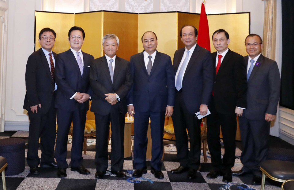 阮春福会见《日经新闻》总裁兼社长冈田直敏。图自越通社