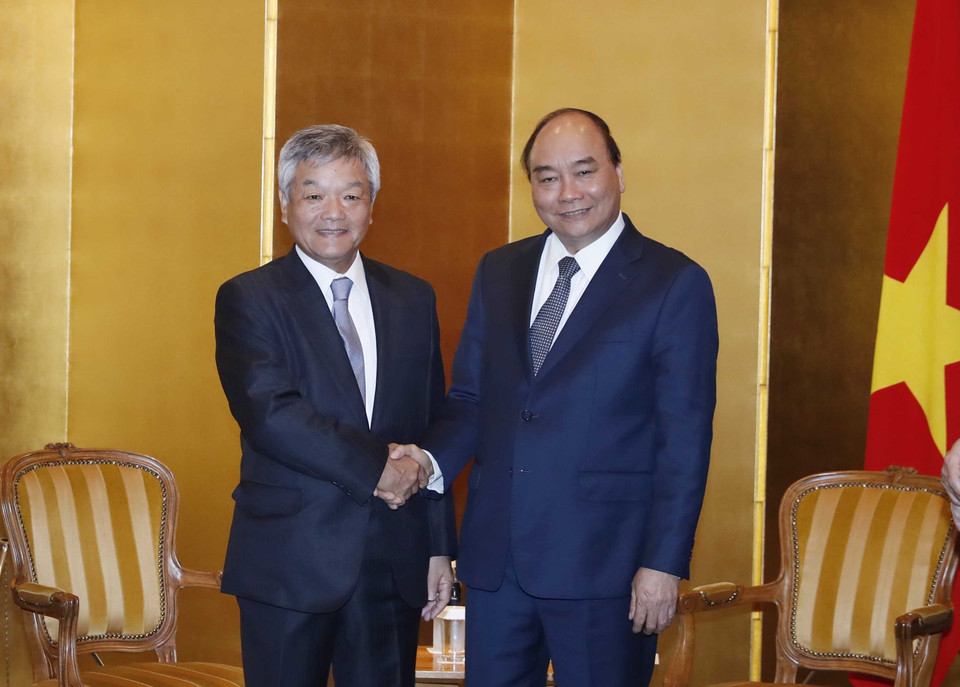 阮春福会见《日经新闻》总裁兼社长冈田直敏。图自越通社