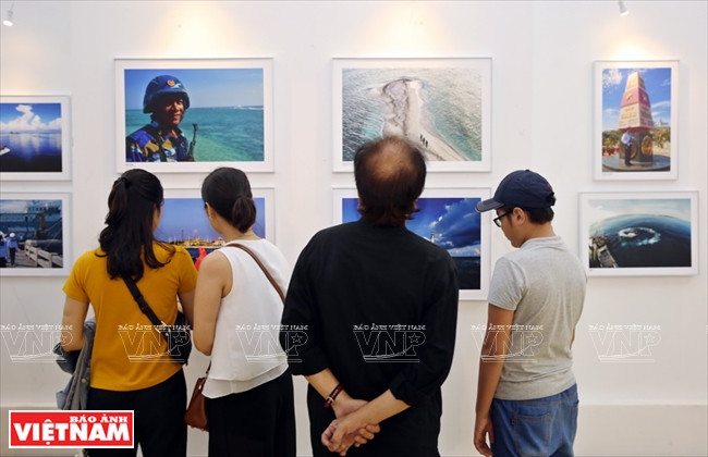 以真实拍摄视角，《我心中的长沙》图片展的作品让观众更加了解长沙岛县的生活。图自越通社