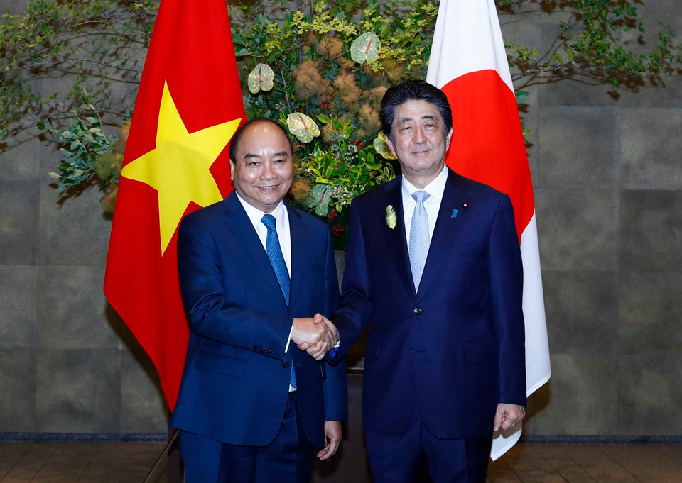 越南政府总理阮春福与日本首相安倍晋三。越通社记者统一 摄