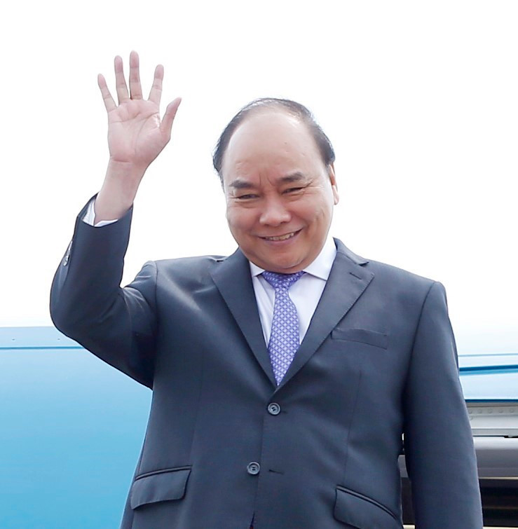 越南政府总理阮春福启程出席暹粒省召开的第三届湄公河委员会峰会。越通社记者 统一 摄