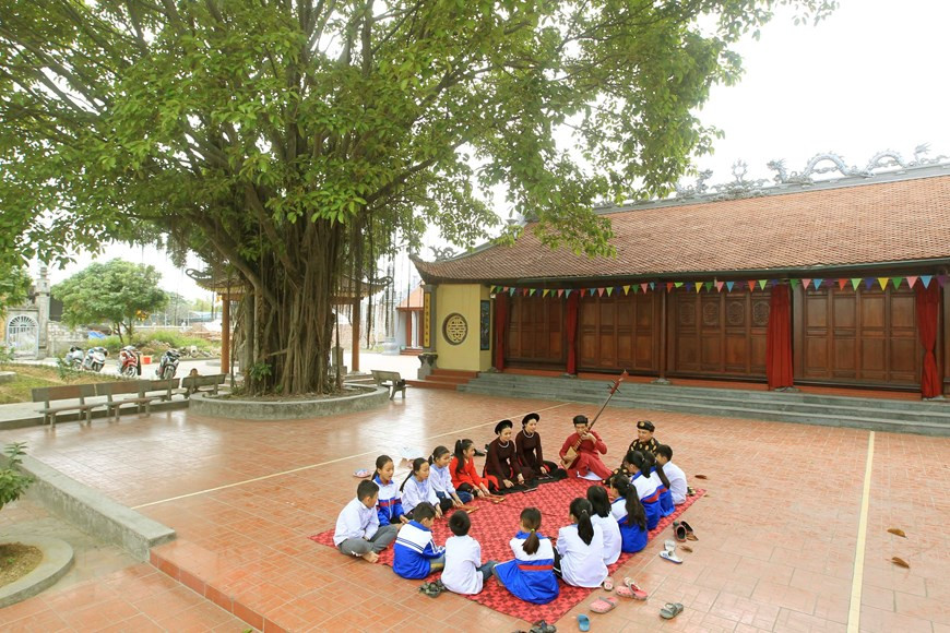 东门筹曲俱乐部于每周六下午在东门亭进行排练。图片来源：越通社