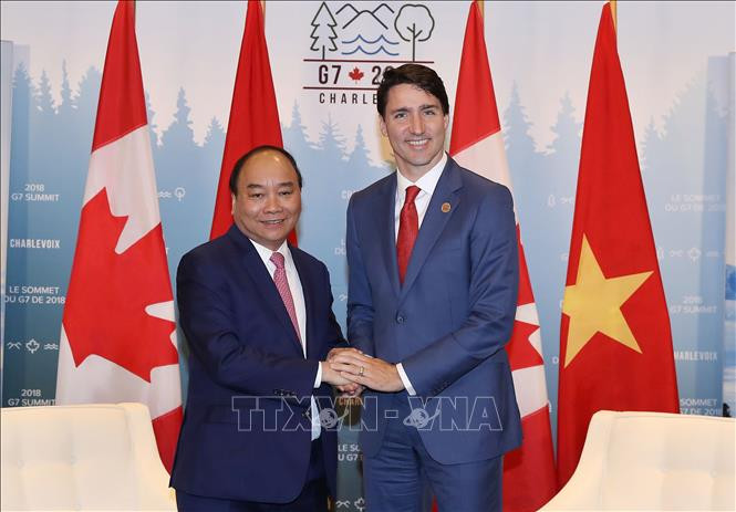 阮春福总理与加拿大总理贾斯汀·特鲁多。图自越通社