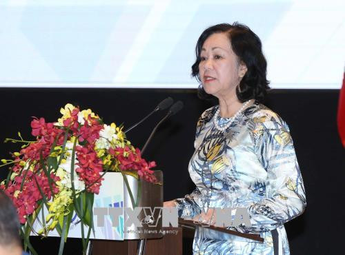 越共中央政治局委员、中央书记处书记、中央民运部长张氏梅发表主旨演讲。越通社记者 伊晋 摄