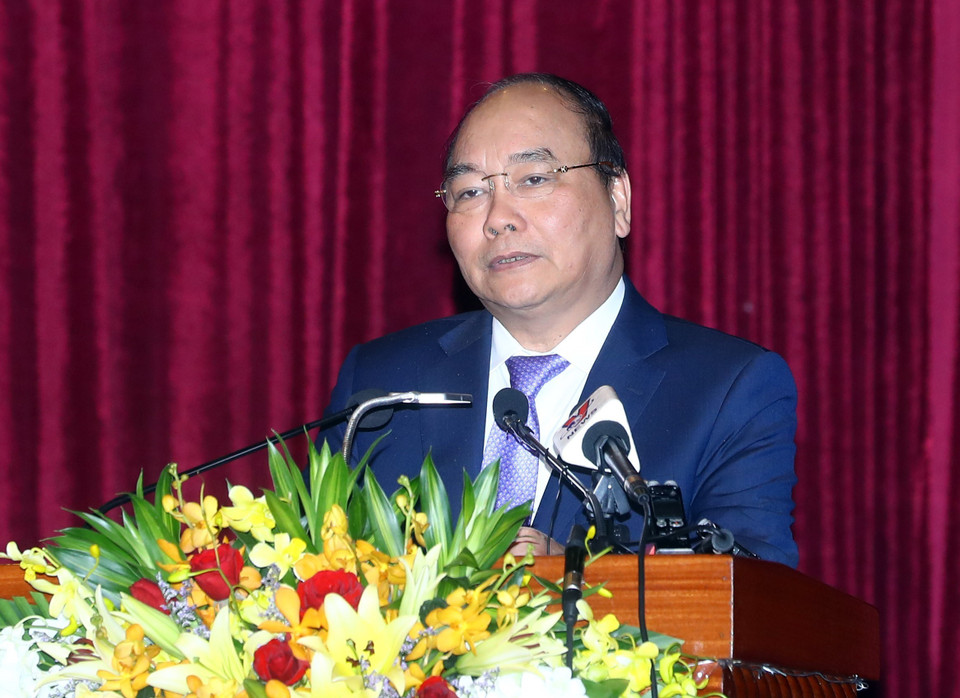 越南政府总理阮春福在会议上发言。越通社记者 统一 摄