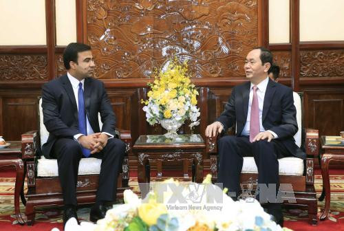  陈大光（右）会见阿富汗新任驻越大使贾楠·莫萨扎伊。越通社记者 颜创 摄