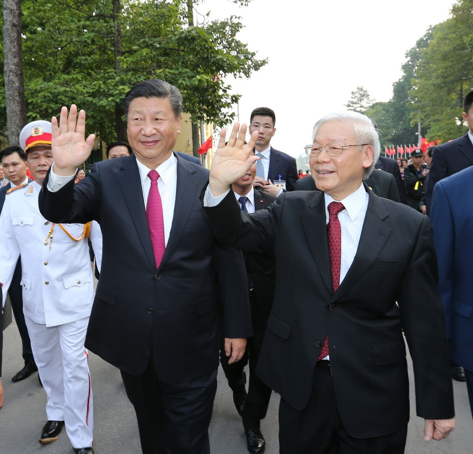 阮富仲与中共中央总书记、国家主席习近平。（图片来源：越通社）