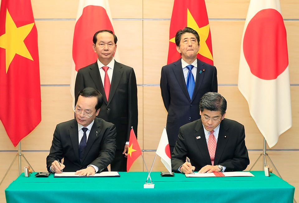 越南建设部与日本土地、基础设施和交通旅游省共同签署关于城市建设与发展的合作备忘录（2018—2021年）。越通社记者 彦创 摄