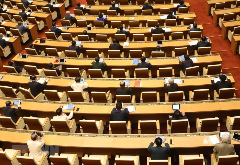 越南国会代表出席第十四届国会第九次会议。图自越通社