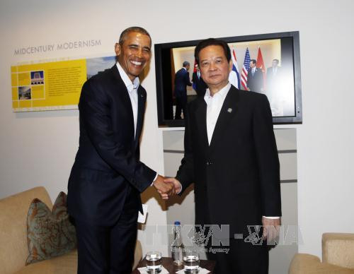  阮晋勇总理会见美国总统奥巴马。（图片来源：越通社）