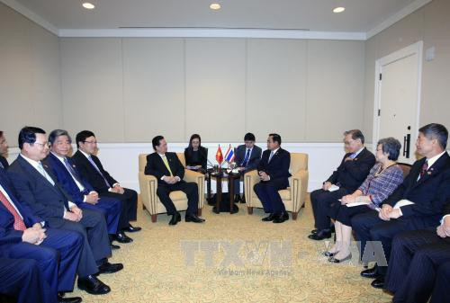  越南政府总理阮晋勇会见泰国总理巴育。（图片来源：越通社）