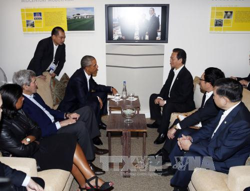  阮晋勇总理会见美国总统奥巴马。（图片来源：越通社）