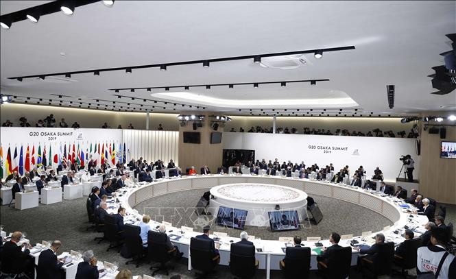 阮春福出席全球经济、贸易和投资的会议。越通社记者 统一 摄