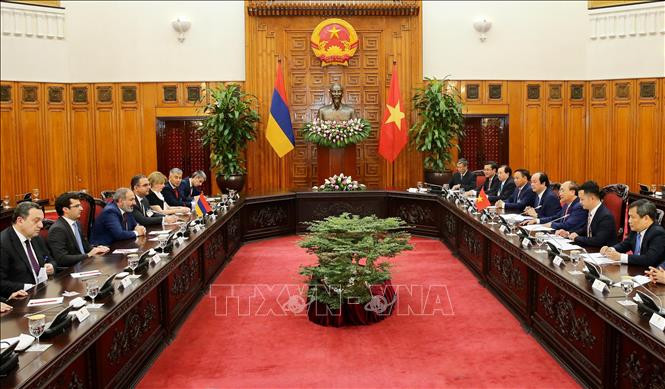 双方会谈场景。图自越通社