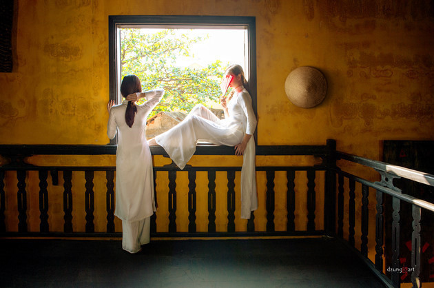 阮国勇的“奥黛”摄影作品，以浓郁的绘画风格成为了他个人的独特标志。（图片来源：越南之声）