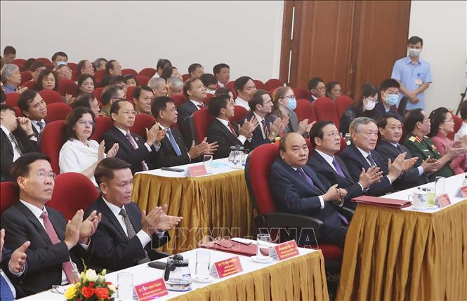 出席越通社建社75周年庆典的政府总理阮春福和各位代表。图自越通社