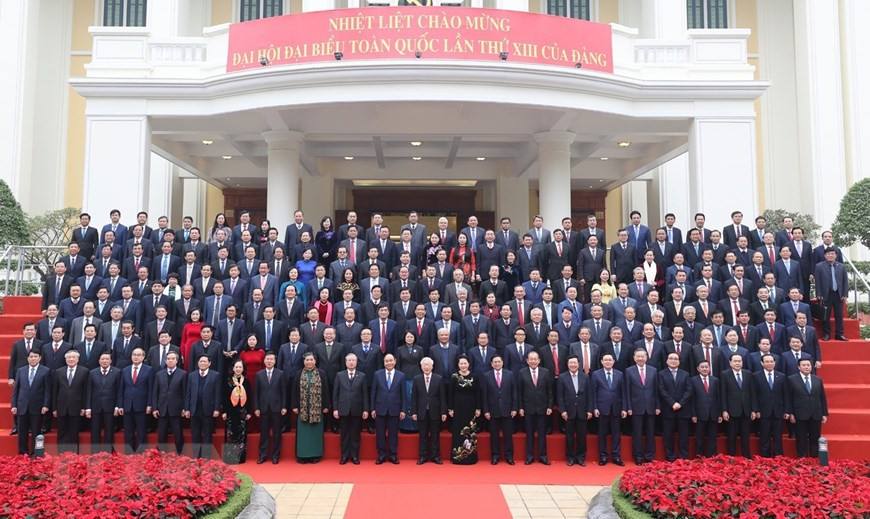 越共中央总书记、国家主席阮富仲以及党和国家领导、越共十二大中央委员会委员一同出席会议。图自越通社