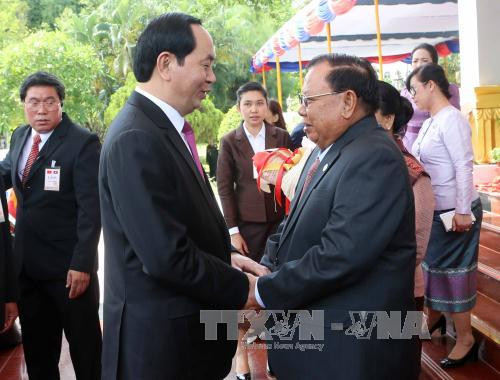  老挝人民革命党中央委员会总书记、国家主席本扬 • 沃拉吉在主席府隆重举行仪式，欢迎陈大光主席一行到访。