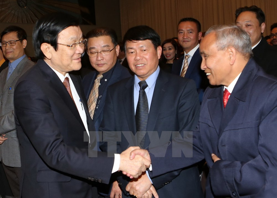 张晋创主席会见旅居德国越南人社群。（图片来源：越通社）