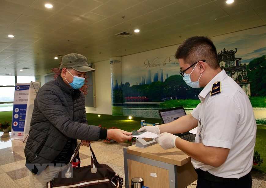 不诚实申报健康状况的人要接受刑事处罚。越通社记者 杨江 摄