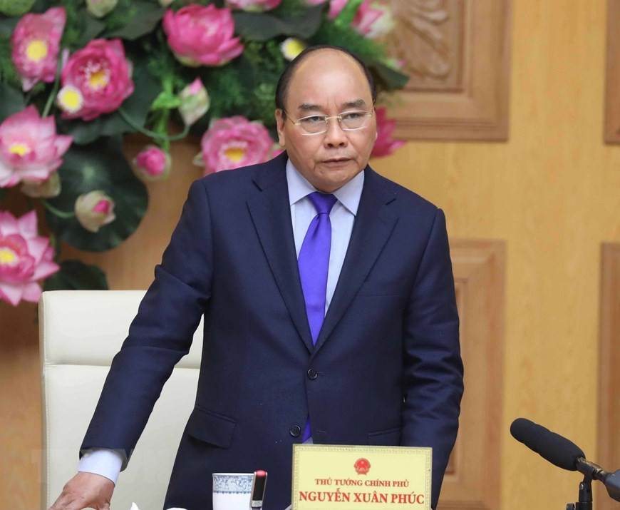 在1月30日举行的政府常务会议上，阮春福强调，“防疫如防敌”，即使全国经济受损也要坚决阻击新冠肺炎疫情，确保人民群众的生命安全和身体健康。（图自越通社）