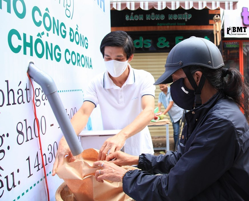 自动“取米机”具备方便、准确、安全等优势。（图自越通社）