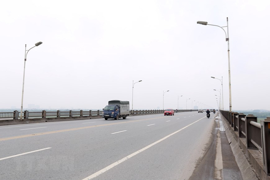 以往一直熙熙攘攘的永绥桥也变得十分安静。越通社记者 英俊 摄