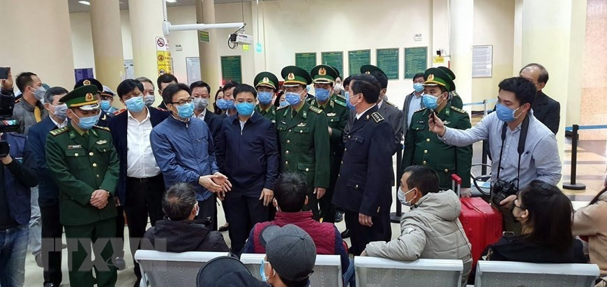 越南政府副总理、新冠肺炎疫情防控国家指导委员会主任武德儋赴广宁省检查疫情防控工作。（图自越通社）