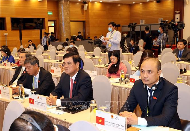 越南代表与会。图自越通社