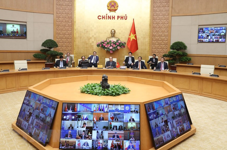 越南政府总理出席应对新冠肺炎疫情的G20视频峰会。图自越通社