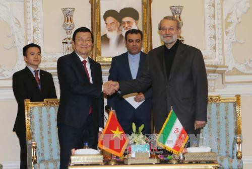  越南国家主席张晋创会见伊朗议会议长阿里·拉里贾尼（Ali Larijani）。（图片来源：越通社）