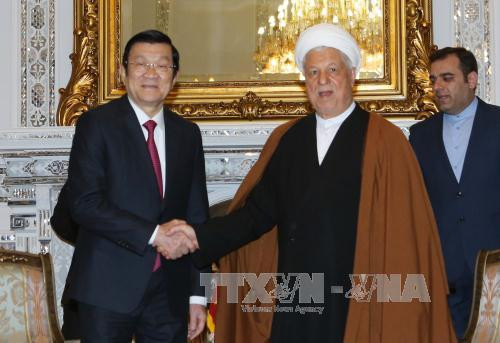  越南国家主席张晋创会见伊朗专家会议主席拉夫桑贾尼（Rafsajani）。（图片来源：越通社）
