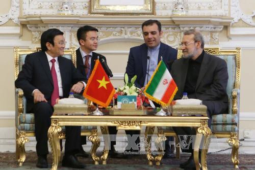  越南国家主席张晋创会见伊朗议会议长阿里·拉里贾尼（Ali Larijani）。（图片来源：越通社）