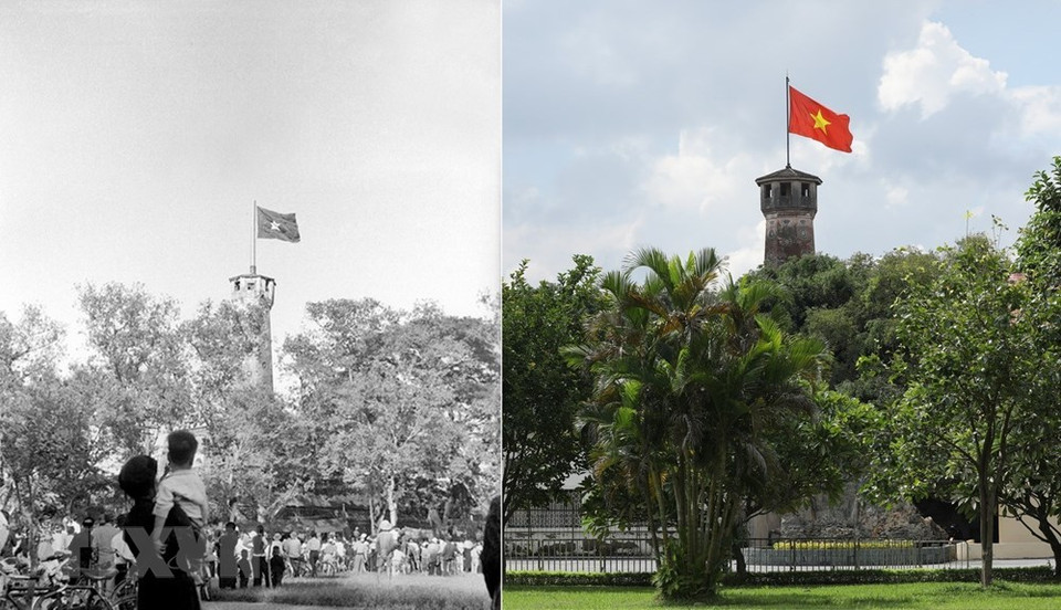 1954年10月10日，全国人民在首都解放日仰望着河内旗台上飘扬的金星红旗。图自越通社