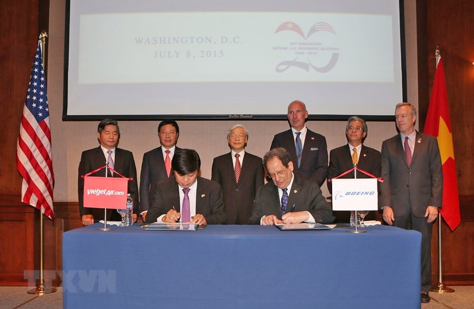 越共中央总书记阮富仲在对美国进行正式访问期间于2015年7月8日出席越捷航空公司（ Vietjet Air ）与美国波音集团的合作备忘录签署仪式。越通社记者 智勇 摄