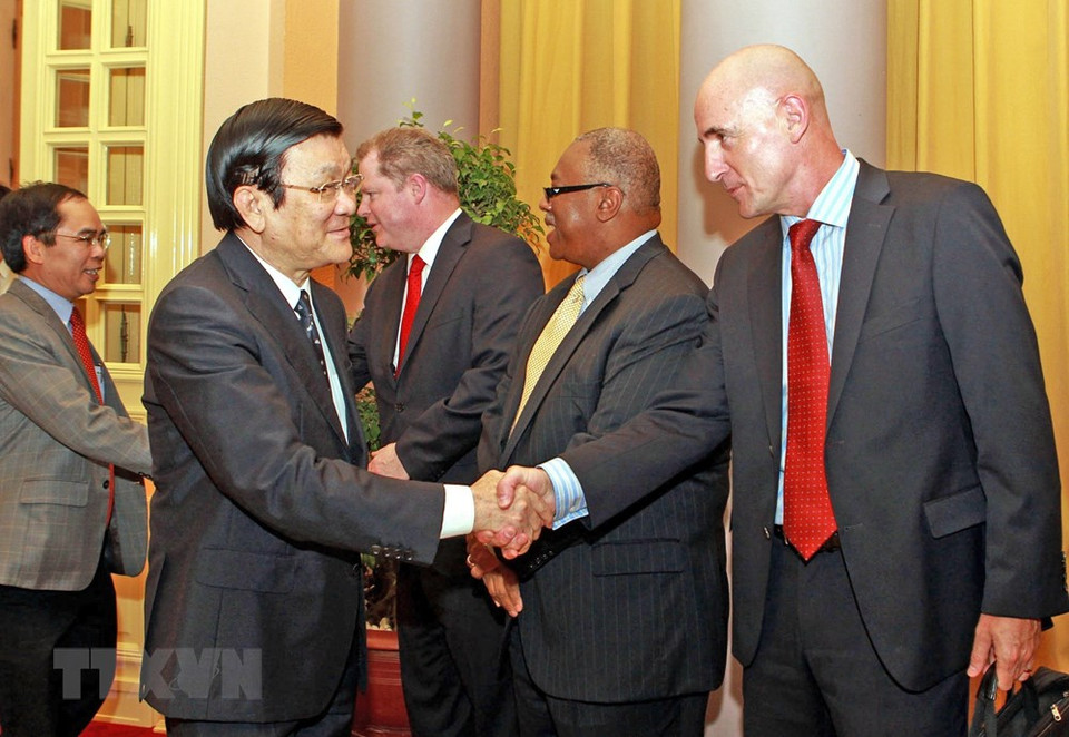 2014年5月22日，越南国家主席张晋创会见美国埃克森美孚石油集团的两位副主席彼得•P•克拉克（Peter P. Clark）和雷蒙德•E•琼斯（Raymond E. Jones）。越通社记者 阮康 摄