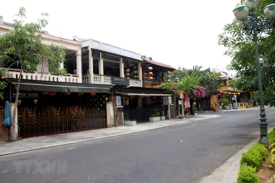 从7月31日零时起至8月14日零时止，会安市严格实施社交距离措施。越通社记者 郑邦任 摄