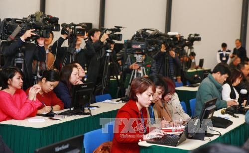 目前共有650名国内记者和100名国外记者注册，报道有关大会的信息。（图片来源：越通社）